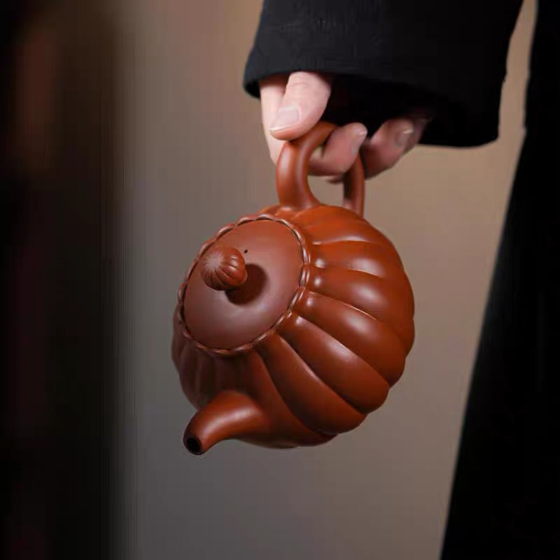 Yixing teapot, pumpkin pot, can be lifted and rotated