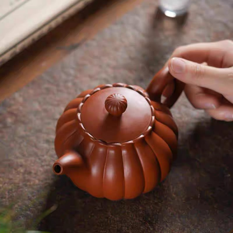 Yixing teapot, pumpkin pot, can be lifted and rotated