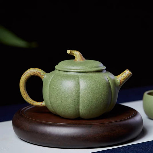 Yixing handmade bean green sand twisted clay teapot