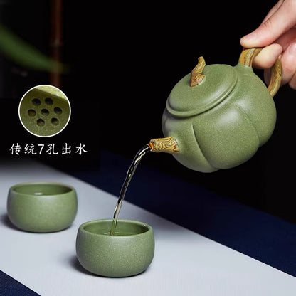 Yixing handmade bean green sand twisted clay teapot