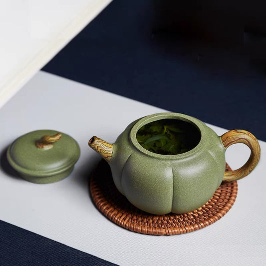 Yixing handmade bean green sand twisted clay teapot