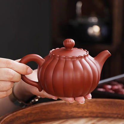 Yixing teapot, pumpkin pot, can be lifted and rotated